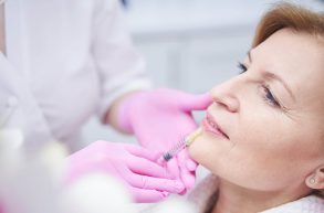adult-woman-receiving-lip-injection-in-beauty-salo-2023-11-27-05-29-33-utc-scaled (1)