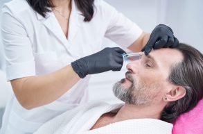 senior-man-being-in-clinic-of-aesthetic-medicine-2023-11-27-04-56-25-utc-scaled (1)